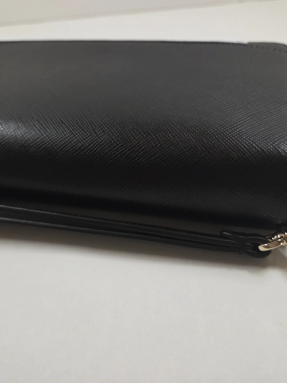 kate spade New York Black Saffiano Wristlet with Gold Logo